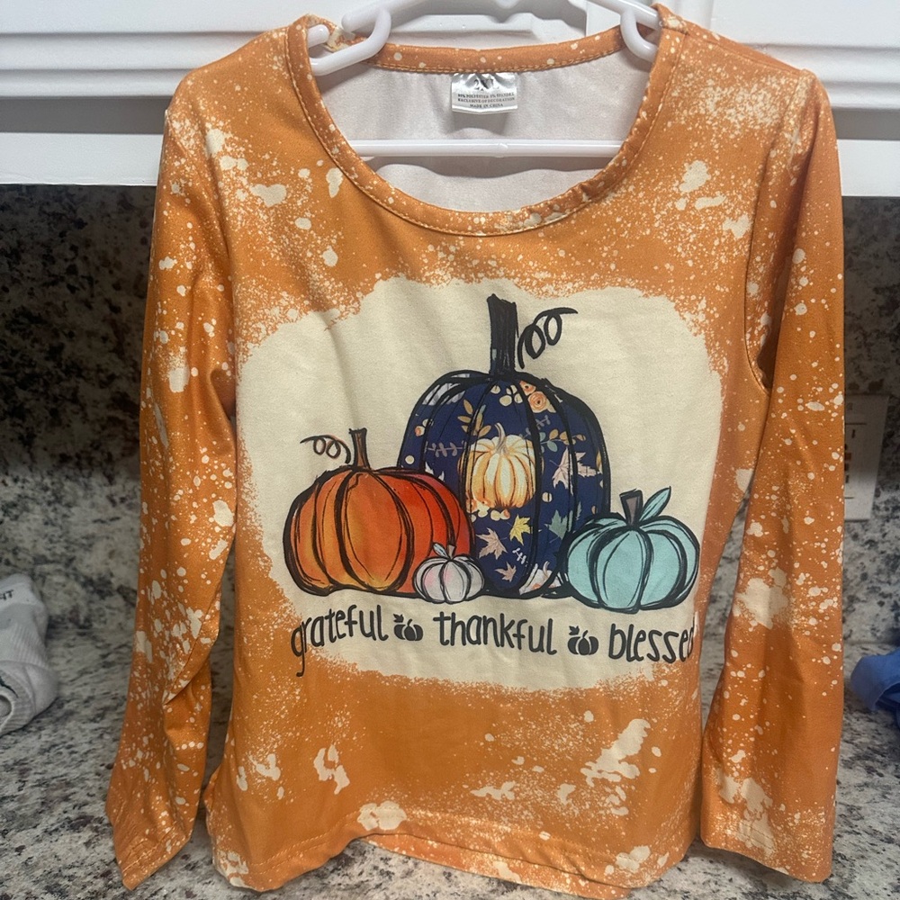 Long sleeve autumn pumpkin printed shirt.